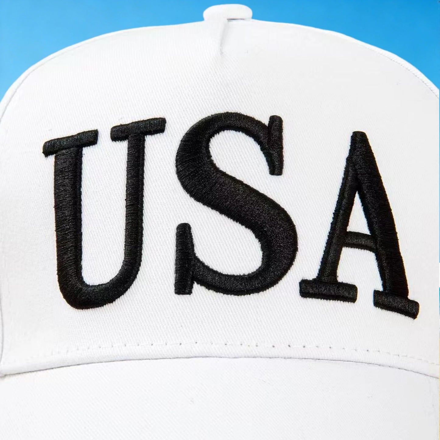 A fashionable white American hat with "45-47" details, perfect for a beach outing, ideal for a leisurely walk by the seaside or