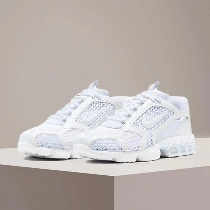 Air Zoom Spiridon Cage 2 -juoksukengät Air Zoom -iskunvaimennustekniikka Luistamaton, kestävä tukirakenne CJ1288-100