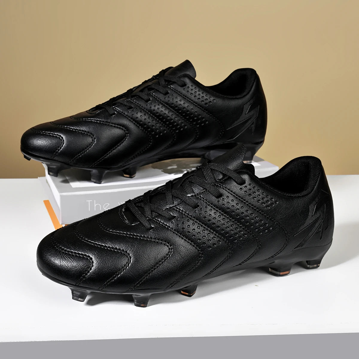 Chaussures de football professionnelles AG/FG, semelle extérieure en TPU antichoc, tige respirante en tissu PU, résistantes à l'usure et antidérapantes pour adultes et enfants