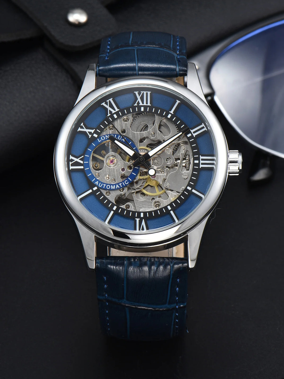 Automatikuhr für Herren, Luxusausführung, Zifferblatt mit römischen Ziffern, sichtbares Uhrwerk (Skelett), wasserdicht, leuchtende Zeiger, Lederarmband – Eine ideale Wahl als Geschenk.